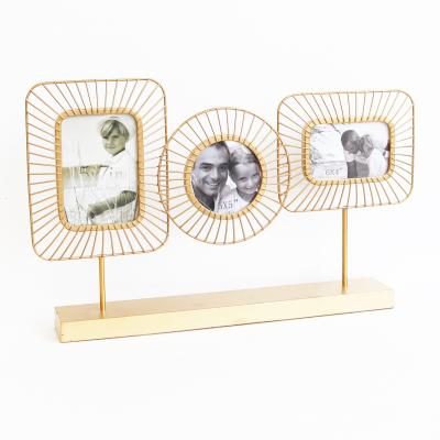 China 100% Handmade Modern Smart Home Gold Table Metal Picture Frame Metal Picture Frame Modular Office Decors for sale