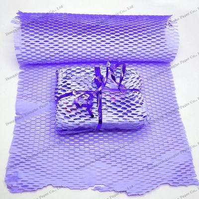 China Eco-friendly Biodegradable Purple Honeycomb Roll Protective Paper Roll Cushioning Anti-collision Wrapping Wrap Custom Rolling Papers for sale