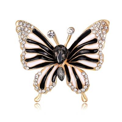 China Beautiful/White Butterfly Brooch Decoration Black Crystals Drip To Enamel Insect Brooches For Women Girls Dress Jewelry for sale