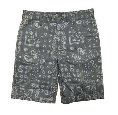 China Anti-pilling kids clothes big boy cotton cashew flower printed casual woven shorts with adjustable elastic waist boy shorts for men for sale