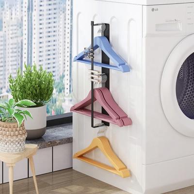 China Multifunctional Household Viable Shelf Magnetic Suction Hanger Storage Rack Free Punch Balcony Drying Rack Hook for sale