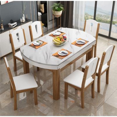 China Luxury Convertible Stainless Steel Square Marble Dining Table Set Imported Furniture for sale