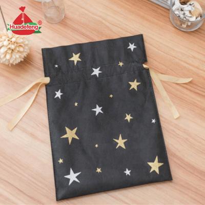 China Huadefeng Star Gold Color Black Recyclable Non Woven Fabric Christmas Gift Bag for sale