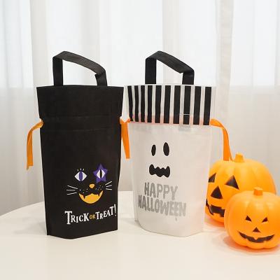 China Reusable Gift Bag Moisture Proof Bag Halloween Black Non Woven Backing Up Pouch Bags for sale