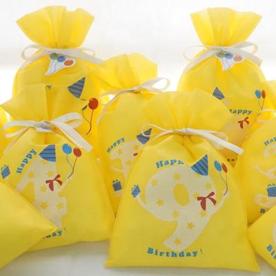 China 1st Birthday Party Decoration Yellow Color PLA Nonwoven Material Material BIODEGRADABLE Gift Bag Customized for sale