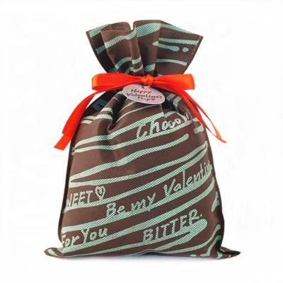 China Custom Logo Drawstring Bag China The Chocolate Gift Packaging Pouches Wholesale Disposable Gift Bag Factory for sale