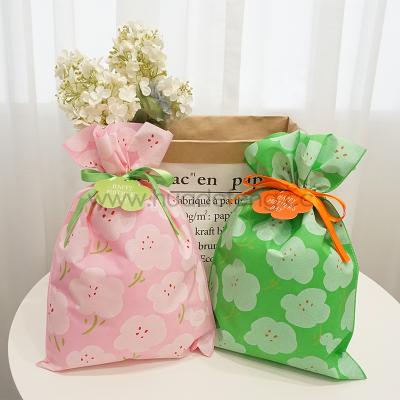 China Disposable China Valentine Gift Packaging Bags Non Woven Bag Drawstring Package Pouch for sale