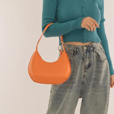 China Vintage Bohai Bags Wholesale Orange Spring Handbags Leather Round Shoulder Handbags For Women for sale