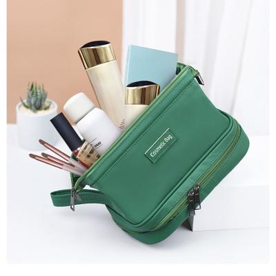 China Portable Fashion Travel Toiletry Cosmetic Bag Storage Waterproof Cosmetic Bag for sale