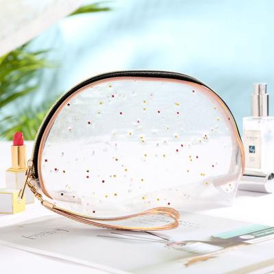 China Fashion Translucent Net Yarn Cosmetic Bag Travel Cosmetic Storage Bag Small Portable Folding Cosmetic Bag for sale