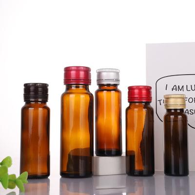 China Custom Liquid Glass Amber Round Bottle Oral Liquid Syrup 20ml 30ml 50ml Pharma Bottle With Aluminum Cap For Medicine Liquid Syrup for sale