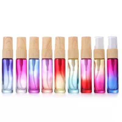 China 10ml Cosmetic Test Spray Glass Perfume Bottles With Pump Wholesale Clear Empty Spray Vial Round Shaped Mini Pocket Perfume Bottle for sale