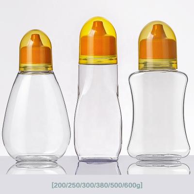 China Honey Seafood Juice And Other Liquids 250ml 380ml 500ml Plastic Pet Squeeze Sauce Bottles With Valve Flip Top Plastic Food Grade Honey Jam Bottles With Lid for sale