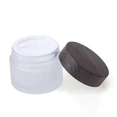 China Food Candy Cosmetic Facial Cream Glass Packaging Clear Frosted 100ml 150ml 250ml 500ml Clear Cosmetic Cream Jar With Bamboo Lid for sale