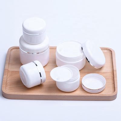 China Popular 10g 30g 50g 100g 150g 200g 4OZ pp white empty plastic containers eye hair face body butter jar cosmetic cream bottle with lids for sale