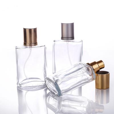 China Square Spray Round High End Clear Glass Cosmetic Bottle 30ml 50ml Spray Glass Bottle For Cosmetic Perfume for sale