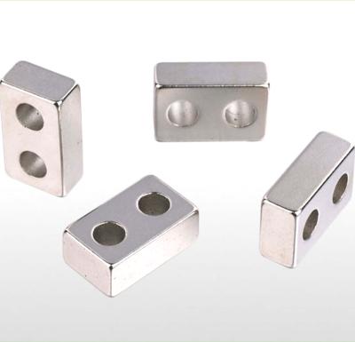 China Industrial Magnet Neodymium Rare Earth Magnet With Screw Holes for sale