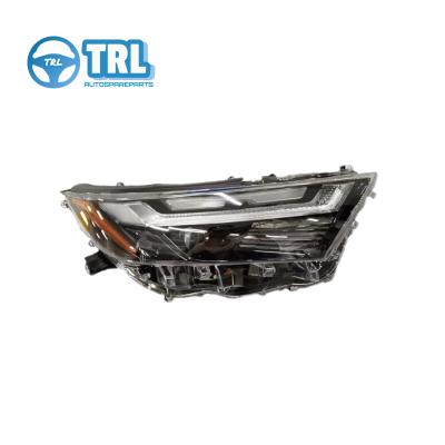 China 8113042650 Toyota Rav4 Lâmpada dianteira e traseira Farol de plástico para automóveis Número de peça 8113042700 à venda