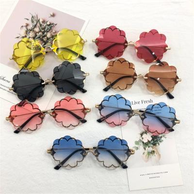 China Fashion Sunglasses Shape Kids Rimless SunglassesFlower Frame Girls Kids Glass Eyewear Cute Outdoor Style Party for sale