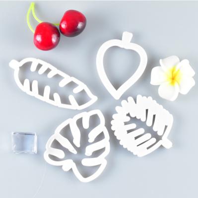 China Viable Plastic 4pcs Tropical Leaves Embossing Mold Tool Fondant Cake Turtle Leaf Cookie Press Back Baking Mold for sale