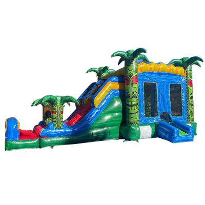 China Juegos de trampolín de salto para niños Inflable verde Tiki Huk Castle Combo Slide Pool en venta