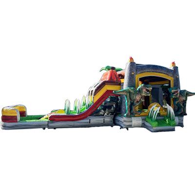 China Jurassic Dinosaurs Commercial PVC Inflatable Bounce House with Slide With Blower for sale