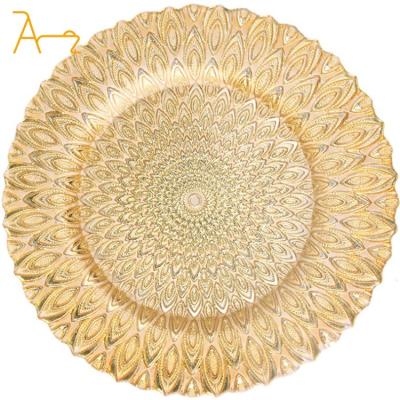 China Sustainable Hot selling glass fancy design peacock pattern charger plates for wedding event decoration gold silver dinner plates for sale