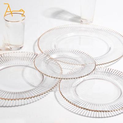 China Sustainable High quality elegant clear gold rim glass charger plate restaurant tableware set silver ribbed glass wedding dinner plates for sale