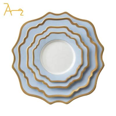 China Sustainable Wholesale custom modern wedding party luxury fancy sunflower shape plates with gold rim ceramic dinnerware set dishes and plates for sale