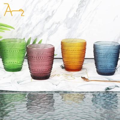 China Sustainable Wholesale Custom Embossed Vintage Beverage Glass Cup Wedding Decorative Colored Glassware Drinking  Water Glass Cups for sale