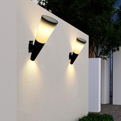 China Garden Torch Shape RGB5050 IP65 LED Polysilicon ABS Modern Solar Wall Light For Outdoor for sale