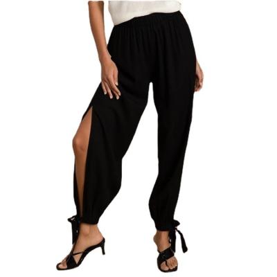 China New Style Women's Solid Color Waist Breathable Hot Selling Elastic Ankle Ties Side Split Harem Pants for sale