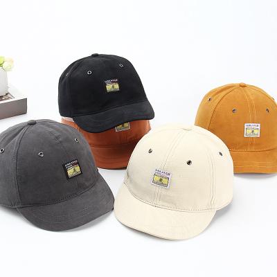 China COMMON GROUND 100% Cotton Fabric Accept Own Logo Short Brim Baseball Cap For Men for sale