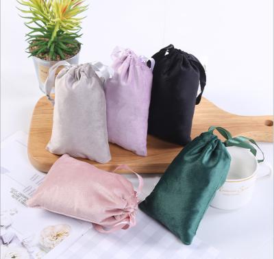 China Foldable Drawstring Pouch Jewelry Packaging Bag Flannel Power Earphone Storage Bag Movable Spot for sale