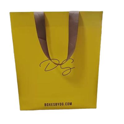 China Recyclable Custom Eco Friendly Shopping Paper Bag Printing Packaging With Handle for sale