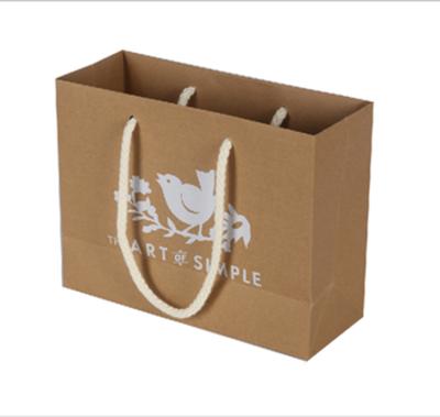 China Wholesale Custom Recyclable Logo Printed Grocery Packaging Craft Brown Paper Tote Shopping Bag With Handle for sale