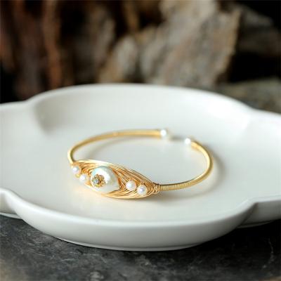 China FASHIONABLE Baroque Aimal Freshwater Pearl Bracelet Deep Plated 14K Gold Handmade Winding Bracelet Creative Jewelry New For Women for sale