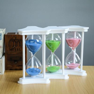 China High Quality White Wooden Colorful Sand Timer Gift Triangle Sand Art Promotional Glass For Timing for sale