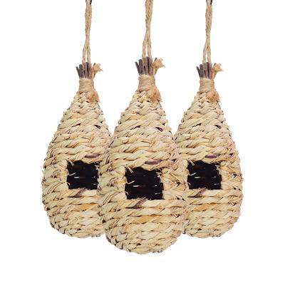 China 2022 Best Seller Sustainable Grass Hand - Woven Hanging Hummingbird House Bird Nest House for sale