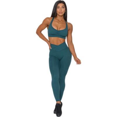 China QUICK DRY Breathable Cross Metal Hollow Bra Yoga Suit Set Women's Sports Fitness Tights for sale