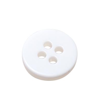 China Viable Wholesale Custom Clothing Fancy Shell Buttons Plastic Resin Button For Shirts for sale