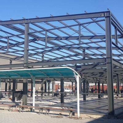 China Modern Design Steel Frame Workshop Exhibition Hall Coal Shed Gas Station Canopy Metal Structures for sale