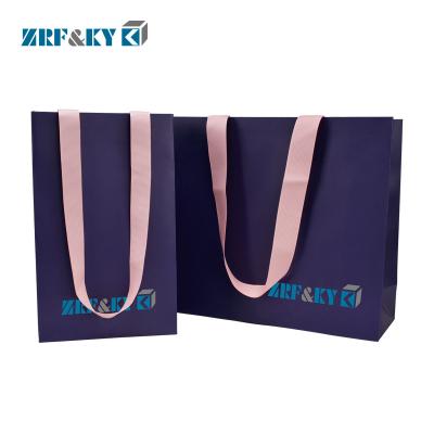 China Recyclable Custom Printed Recycled White Kraft Paper Packaging Shopping Gift Bag for sale