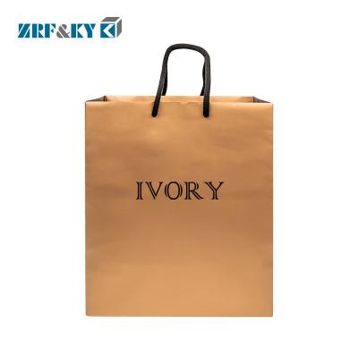 China Recyclable Custom Double Sided Printing Color Paper Shopping Bags with Logo for sale