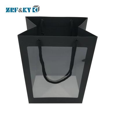 China Recyclable Custom Logo Printed Black Color Birthday Party Flower Gift Packaging Clear/Transparent Window Paper Bags for sale