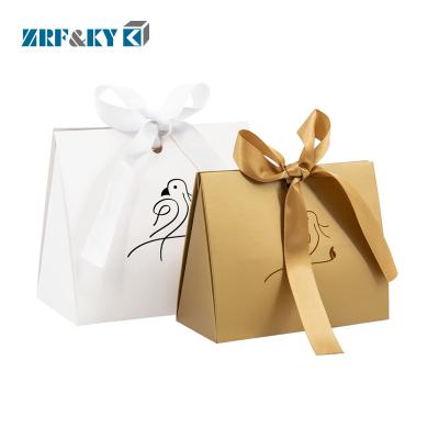 China Recyclable Custom Logo Printed SPA Products Packaging Rigid Paper Gift Set Box With Ribbon for sale