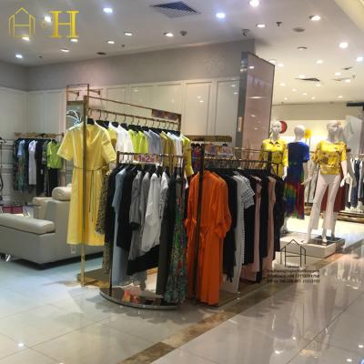 China Ladies clothing store design; Wooden Retail Store Decoration Design Clothing Display Racks Ladies Clothing Store Decoration Design Ideas for sale