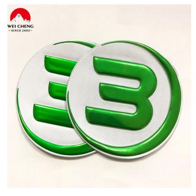 China Custom viable 3D metal heat transfer color tpu neon green metallic label for sale