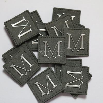 China Viable Metallic Silver Embossed 3D Iron On Transfer Cap Backpack Rubber Patches for sale