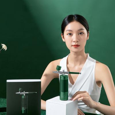 China Customize Hyperbaric HandHeld Facial Skin Care Devices Mini Facial Atomization Sprayer for sale